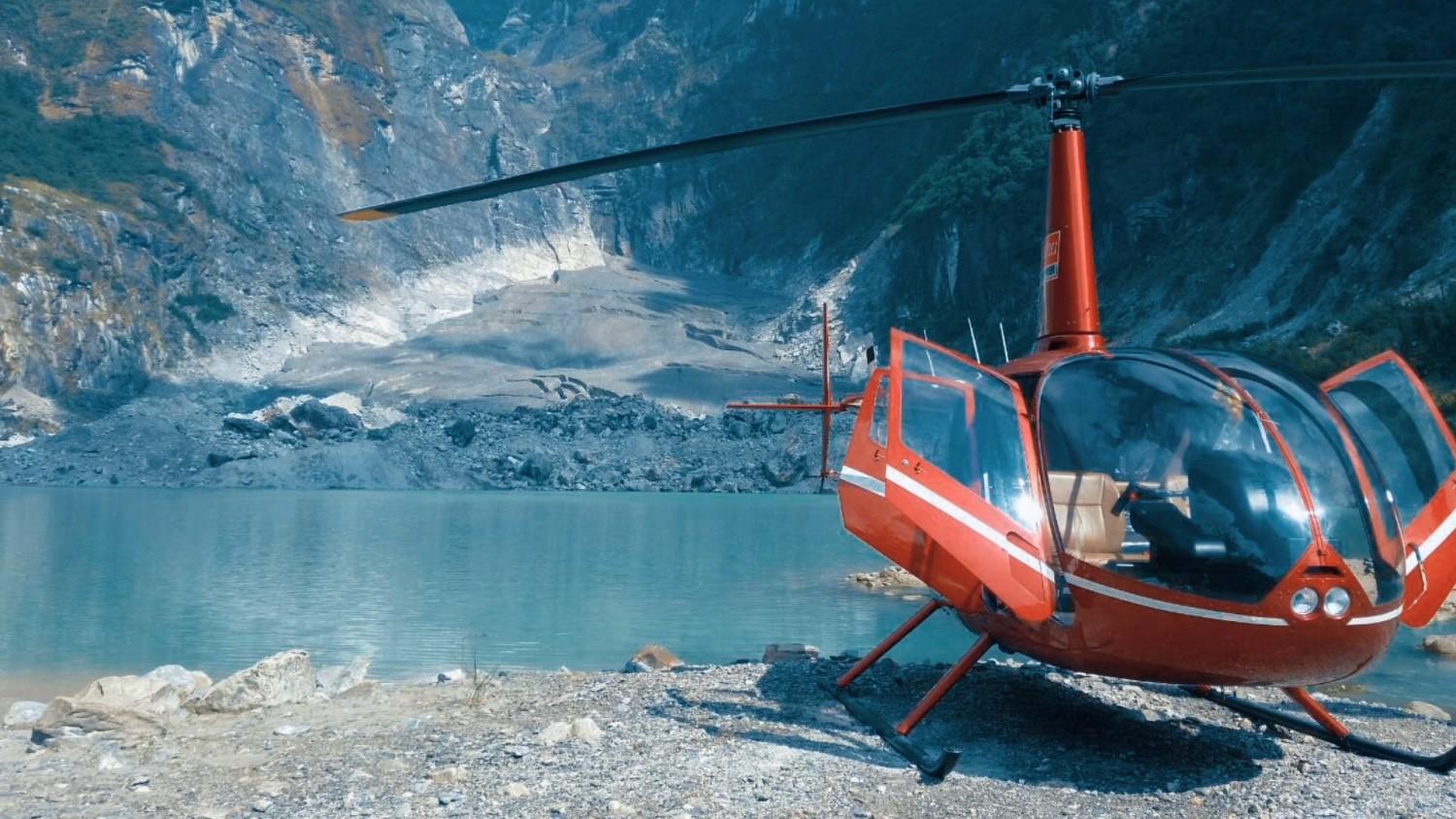 A helicopter landed in Kapuche Lake - Kapuche Lake Helicopter Tour