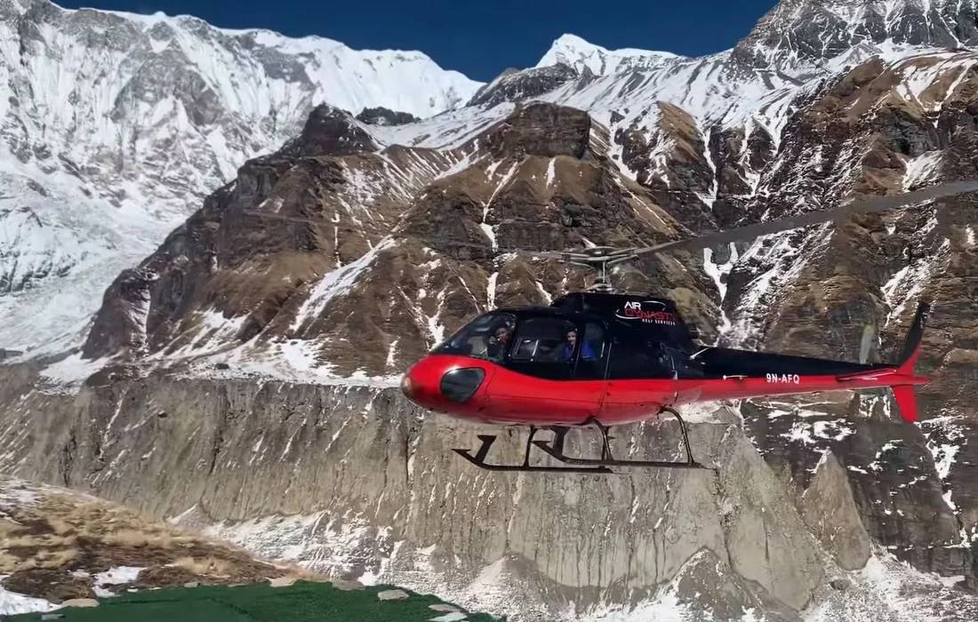 A helicopter on way to Annapurna Base Camp Heli Tour from Pokhara A helicopter on way to Annapurna Base Camp Heli Tour from Pokhara